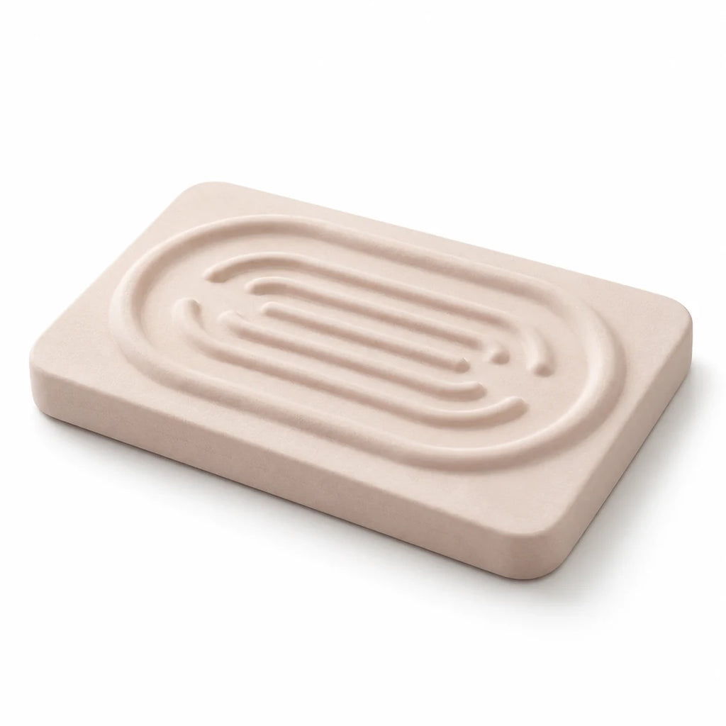 Porte-savon Convex SOVO en diatomite beige présenté seul sur fond blanc