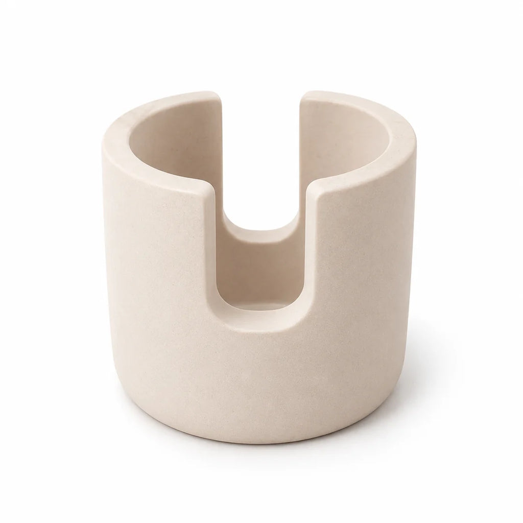 Porte-éponge SOVO en diatomite beige avec deux ouvertures opposées, présenté sur fond blanc