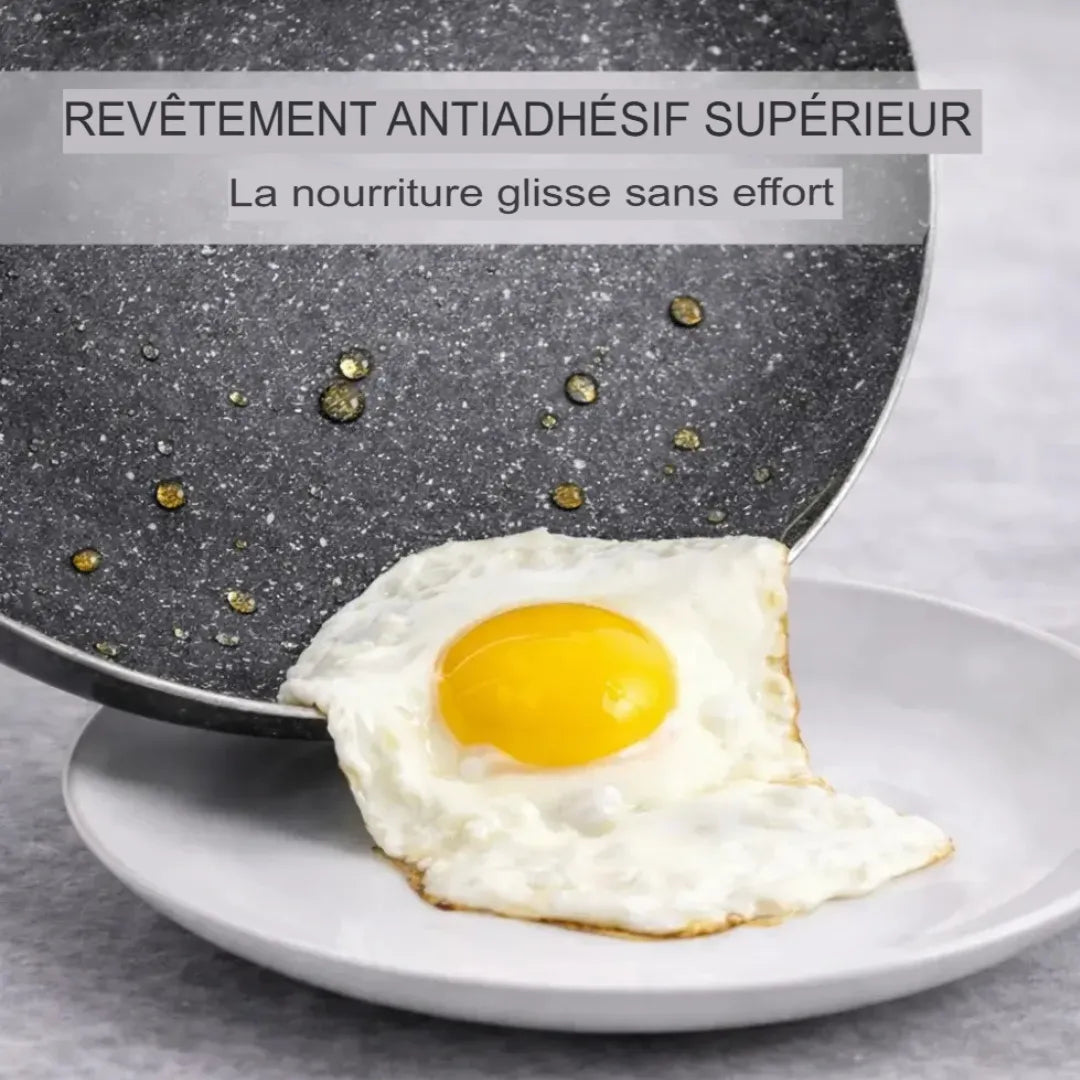 Revêtement antiadhésif supérieur effet pierre : la nourriture glisse sans effort, idéal pour les œufs et cuissons délicates.